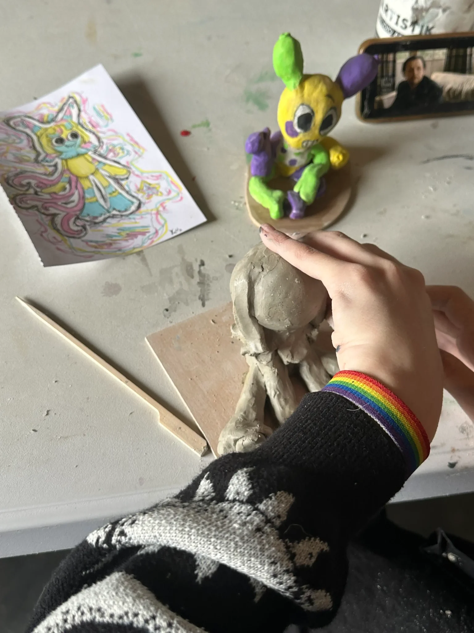 student in work shaping their clay sculptures at be creative cornwall